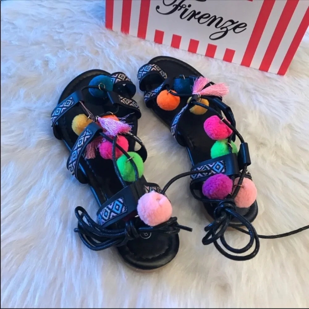 Firenze Pom Pom sandals.